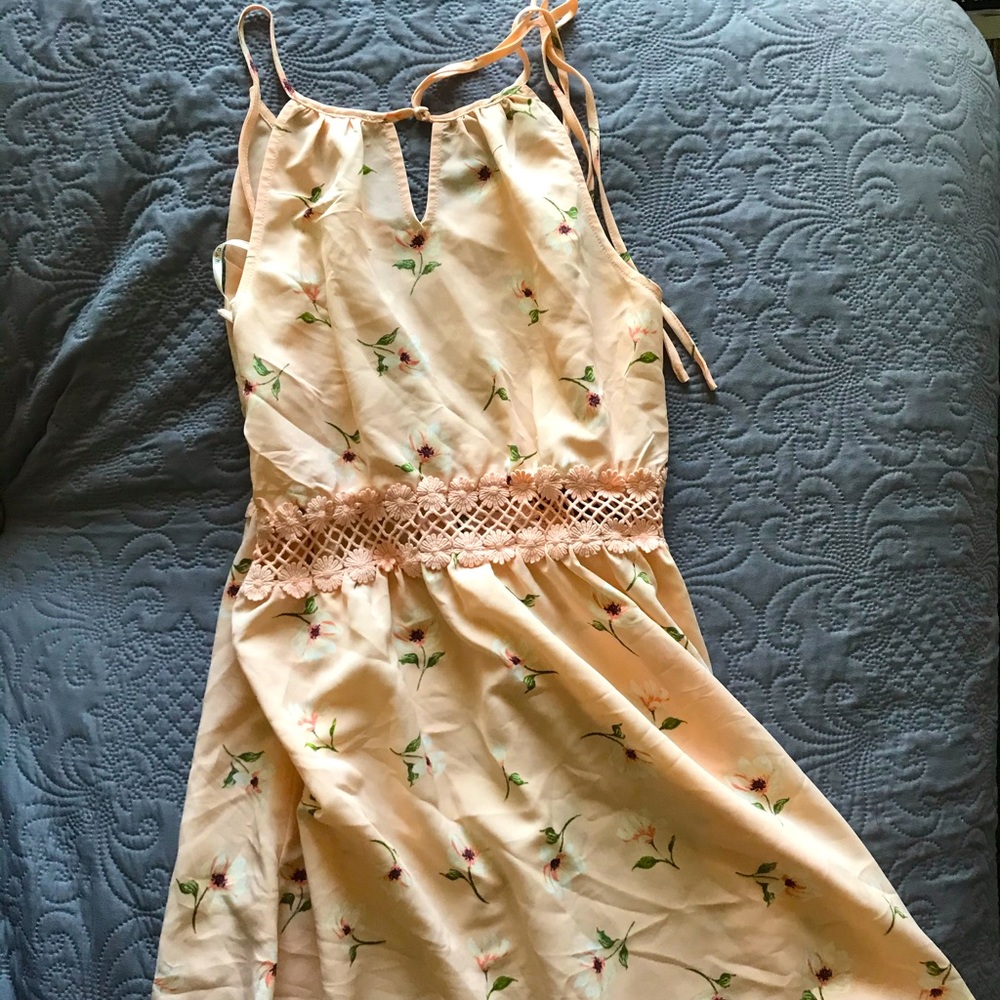 Beige floral skater style dress.